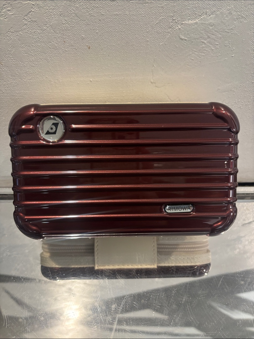 Rimowa Metallic Maroon Hard Shell Travel Case